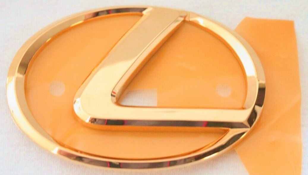 EMBLEMA - Logo. Trasero. Dorado foto 1